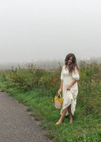 Maxikleid mit Smok-Oberteil, Blumenmuster Elfenbein